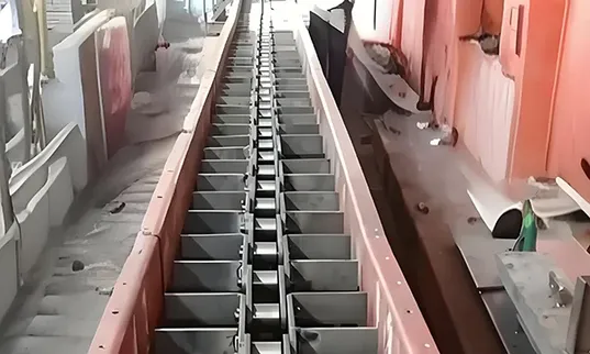 Convoyeur à raclettes